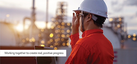 Worker with hard hat at industrial facility