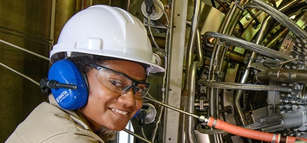 Field Service worker analyzing machinery